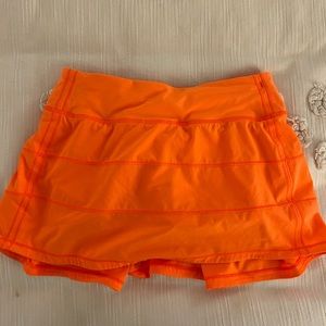 Highlight orange lululemon pace rival skirt 12"